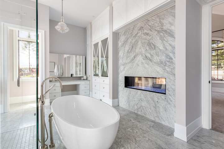 Luxury fireplace in bathroom remodeling with oval bathtub for Vallejo, California home